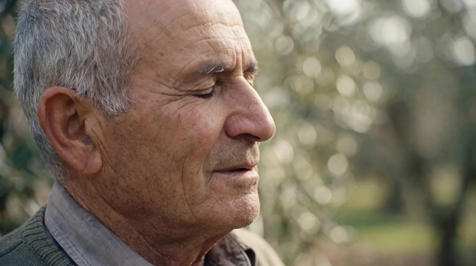The farmer in the morning light, eyes closed